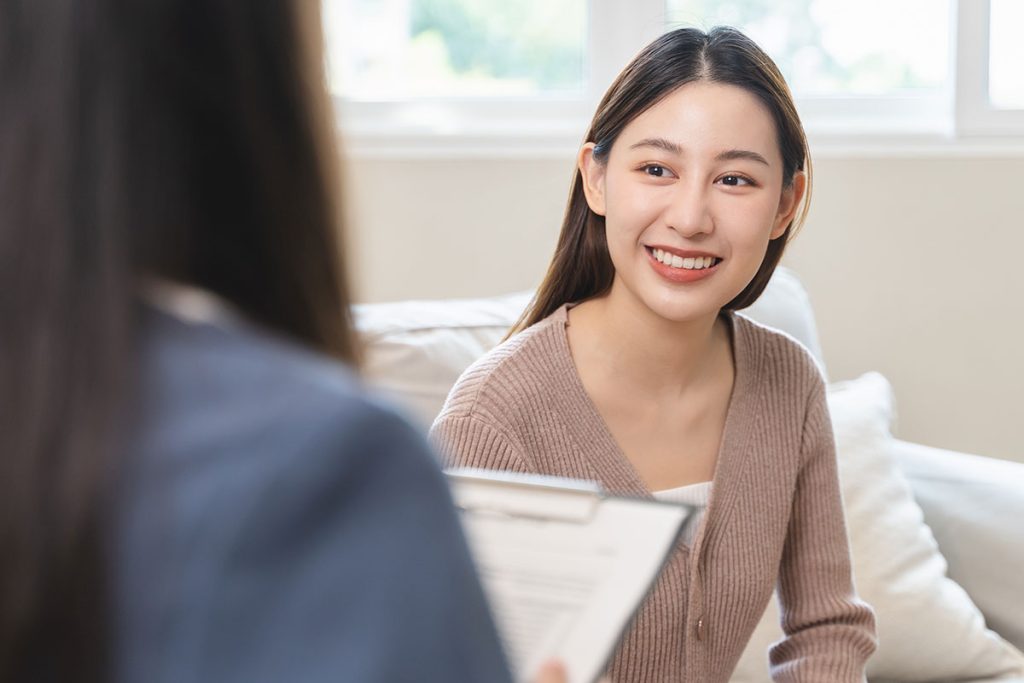 Female patient receiving medical advice from healthcare professional